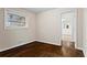 Bedroom featuring hardwood floors, a window, and a closet at 2771 Ridge Park Dr, Tucker, GA 30084