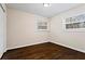 Bright bedroom with hardwood floors and natural light streaming through the windows at 2771 Ridge Park Dr, Tucker, GA 30084