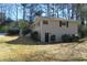 Backyard view of a home with a well maintained lawn at 2771 Ridge Park Dr, Tucker, GA 30084