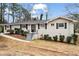 Charming single-story home with a painted brick exterior, neat landscaping, and a welcoming front entrance at 2771 Ridge Park Dr, Tucker, GA 30084