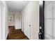 The front entryway and hall feature hard wood floors and neutral paint at 2771 Ridge Park Dr, Tucker, GA 30084