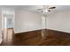 A spacious living room featuring hard wood floors, fresh neutral paint, and a ceiling fan at 2771 Ridge Park Dr, Tucker, GA 30084