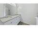 Bathroom with double vanity, granite countertop, and shower at 6207 Willowbrook Dr, Riverdale, GA 30296