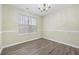 Simple dining area with neutral walls and vinyl flooring at 6207 Willowbrook Dr, Riverdale, GA 30296