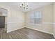 Bright dining room with hardwood floors and a chandelier at 6207 Willowbrook Dr, Riverdale, GA 30296