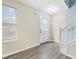 Bright entryway with stairs, vinyl flooring and neutral walls at 6207 Willowbrook Dr, Riverdale, GA 30296