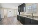 Kitchen with dark cabinets, granite counters, and stainless steel appliances at 6207 Willowbrook Dr, Riverdale, GA 30296