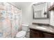 Clean bathroom with granite countertop and nautical theme at 4302 Maclaren Ct, Powder Springs, GA 30127