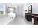 Elegant bathroom with soaking tub and walk-in shower at 4302 Maclaren Ct, Powder Springs, GA 30127
