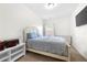Cozy bedroom with a queen-size bed and ample storage at 4302 Maclaren Ct, Powder Springs, GA 30127