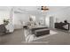 Virtually staged main bedroom with ample space at 4302 Maclaren Ct, Powder Springs, GA 30127