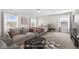 Virtually staged bedroom showcasing design potential with large windows at 4302 Maclaren Ct, Powder Springs, GA 30127