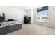 Bright bedroom with large window, built-in shelving, and Star Wars themed decor at 4302 Maclaren Ct, Powder Springs, GA 30127