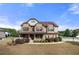 Two story brick home with landscaped yard and large driveway at 4302 Maclaren Ct, Powder Springs, GA 30127