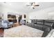 Living room with view into kitchen and comfortable seating at 4302 Maclaren Ct, Powder Springs, GA 30127