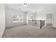 Versatile loft area with neutral carpeting and natural light at 4302 Maclaren Ct, Powder Springs, GA 30127