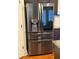 Stainless steel refrigerator with water and ice dispenser at 4302 Maclaren Ct, Powder Springs, GA 30127