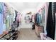 Large walk-in closet with ample shelving and hanging space at 4302 Maclaren Ct, Powder Springs, GA 30127