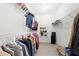 Large walk-in closet with ample shelving and hanging space at 4302 Maclaren Ct, Powder Springs, GA 30127