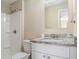 Bathroom with granite vanity and shower/tub combo at 475 Shannon Way, Lawrenceville, GA 30044