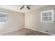 Spacious bedroom with ceiling fan and neutral decor at 475 Shannon Way, Lawrenceville, GA 30044