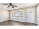 Bright living room with wood-look floors and a large window at 475 Shannon Way, Lawrenceville, GA 30044