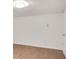 Spacious, blank basement room with wood-look flooring and neutral walls at 2530 Ashbourne Dr, Lawrenceville, GA 30043