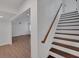 View of the basement with wooden stairs and flooring at 2530 Ashbourne Dr, Lawrenceville, GA 30043