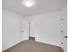 Well-lit bedroom featuring neutral walls and carpet flooring at 2530 Ashbourne Dr, Lawrenceville, GA 30043