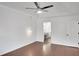 Large bedroom with ceiling fan and access to bathroom at 2530 Ashbourne Dr, Lawrenceville, GA 30043