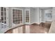 Breakfast area with hardwood floors and a view of the backyard at 2530 Ashbourne Dr, Lawrenceville, GA 30043