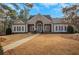 Community clubhouse with stone accents and landscaping at 2530 Ashbourne Dr, Lawrenceville, GA 30043