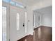 Bright entryway with hardwood floors and a glass door at 2530 Ashbourne Dr, Lawrenceville, GA 30043
