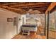 Covered deck with hot tub and access to backyard at 2530 Ashbourne Dr, Lawrenceville, GA 30043