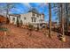 Two story house exterior with deck and firepit at 2530 Ashbourne Dr, Lawrenceville, GA 30043