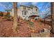 Two story house exterior with deck and firepit at 2530 Ashbourne Dr, Lawrenceville, GA 30043