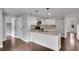 Kitchen with granite countertops and white cabinets at 2530 Ashbourne Dr, Lawrenceville, GA 30043