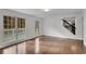 Living room with hardwood floors and access to deck at 2530 Ashbourne Dr, Lawrenceville, GA 30043