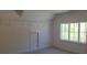 Bright bedroom featuring neutral paint and carpet, closet, and large windows at 4525 Aiden Way, Cumming, GA 30041