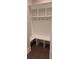 Mudroom with built in shelves, hooks, and a bench at 4525 Aiden Way, Cumming, GA 30041