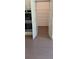 Open pantry with stainless steel oven and floor-to-ceiling shelves at 4525 Aiden Way, Cumming, GA 30041