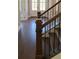 Staircase with beautiful wood and metal railings at 4525 Aiden Way, Cumming, GA 30041
