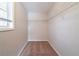 Walk-in closet with wire shelving and neutral carpeting at 7110 Ravenwood Ln, Lithonia, GA 30038