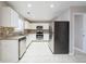 Kitchen with granite countertops and stainless steel appliances at 7110 Ravenwood Ln, Lithonia, GA 30038