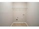 Laundry room with shelving and tile flooring at 7110 Ravenwood Ln, Lithonia, GA 30038