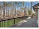 Spacious deck overlooking wooded backyard, perfect for outdoor entertaining at 2283 Stratmor Dr, Tucker, GA 30087