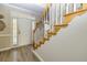 Bright entryway with hardwood floors and a staircase at 239 Darwish Dr, Mcdonough, GA 30252