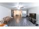 Open concept living and dining area with wood floors at 417 Ridge Creek Dr, Clarkston, GA 30021