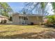 Spacious backyard with grassy area and home view at 1255 Glen Forest Way, Decatur, GA 30032