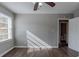 Well-lit bedroom with wood-look floors and access to bathroom at 1255 Glen Forest Way, Decatur, GA 30032